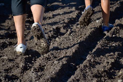 Crossing the arena in the Polson Fairgrounds was a dirty deal.