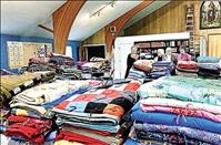 Prolific quilters send off a year’s work