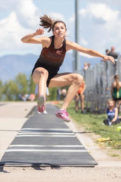 Ronan Maiden Olivia Clairmont competes in the long jump during the Nelson Thomas ABC track and field meet held at the Polson Sports Complex on Saturday. 