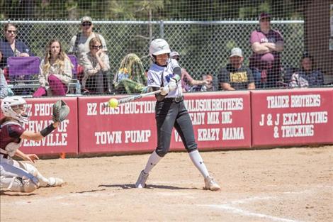 MAC slugger Kooper Page makes contact with the ball.