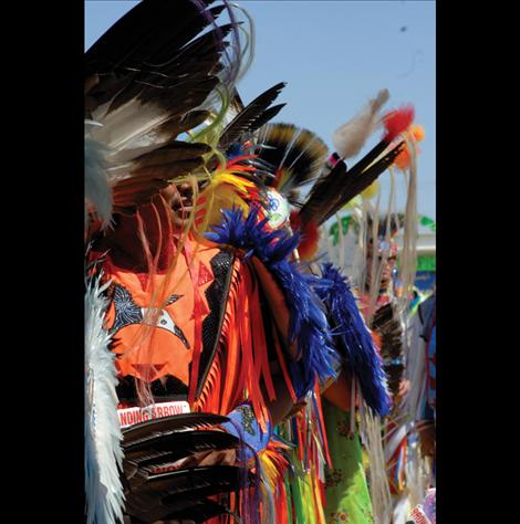 Dancers line up for the 1 p.m. Grand Entry at the Standing Arrow Powwow held at the Elmo powwow grounds.