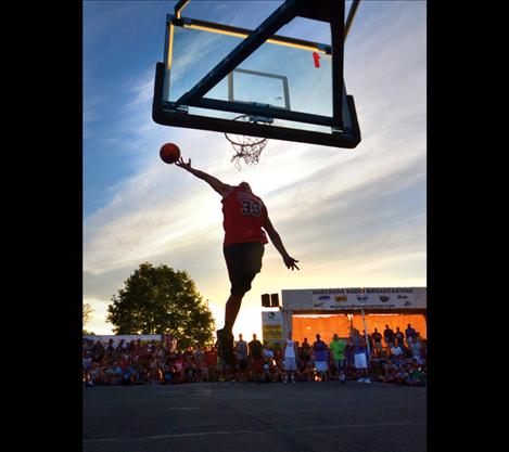 Conner Woodill crashes the hoop in fine form to earn a first-place finish in the slam dunk contest — and $1,000.