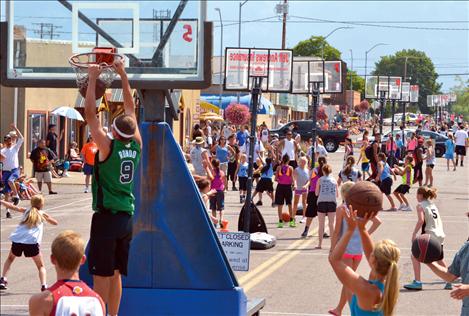 The side streets of downtown Polson were bustling with ball players Saturday and Sunday.
