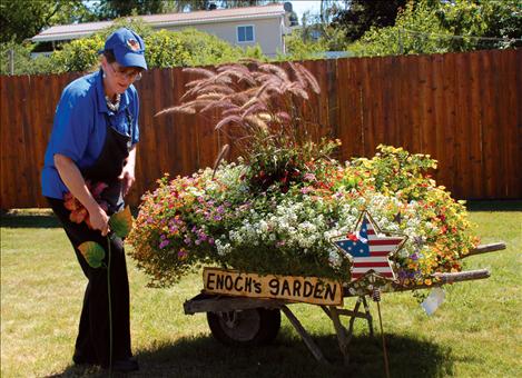 Marcia Moen from Richwine’s Burgerville won the Best Bloomin’ Business award. Her favorite part of the flowers around the restaurant is Enoch’s Garden in honor of her dad, Enoch Richwine. 