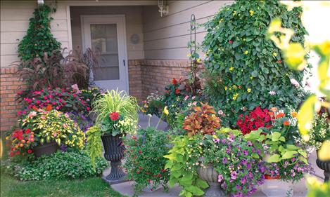 Marshell Fox wins for Best Bloomin’ Residence. Many more blossoms and plants adorn her duplex on Hillcrest Lane.