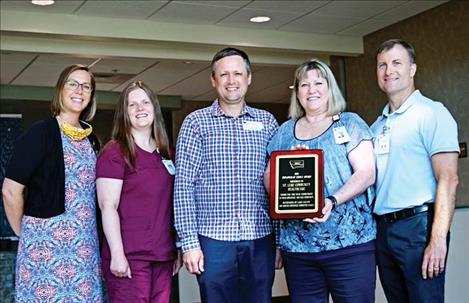 St. Luke Community Healthcare was recently presented the 2021 Employer of Choice award. From left are: Whitney Liegakos (PR Manager), Abigail Byers (Director of Nursing), Kris Schock (Lake County JSEC Co-coordinator), Theresa Jones (HR Manager), and Steve Todd (CEO of St. Luke)