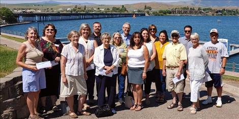 Recipients of the 2021 Greater Polson Community Foundation grant cycle pose for a lakeside photo.
