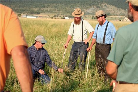 Justin Morris, pasture management specialist for the Natural Resources Conservation Service, talks about rotational grazing in St. Ignatius during the fourth pasture walk. 