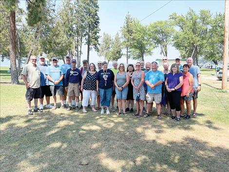 Polson High School class of 1980 celebrants pose for a photo at Boettcher Park.