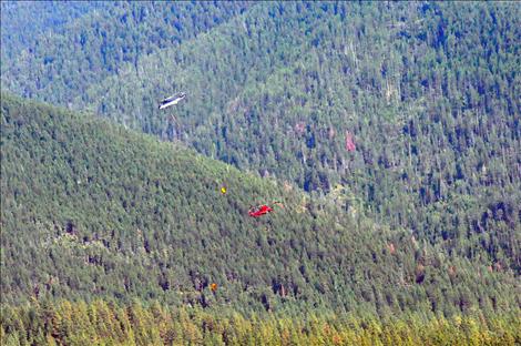 Overhead traffic was constant as crews fought the Firestone Flats fire from the air.