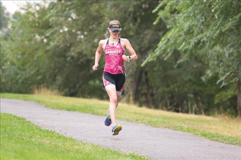Women’s  winner Scarlet Kaplan races to the finish line.
