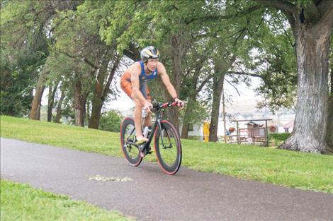 Polson Triathlon winner Matt Seeley heads to the final stage of the triathlon.