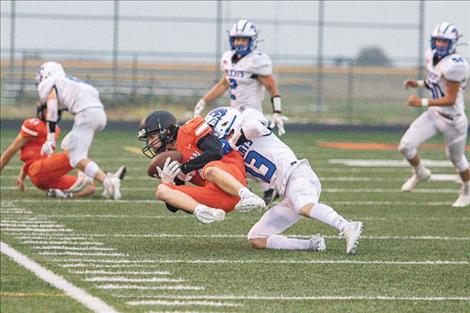 Ronan Chief Mason Clairmont makes a catch during Friday night’s game against the Columbia Falls Wildcats.