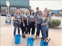 Volunteers clean-up Polson flowerbed bumpouts