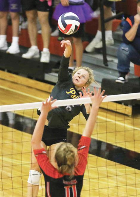 Polson Lady Pirate Camilla Foresti swats one over the net.