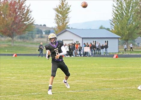 Polson Pirate Jarrett Wilson completes a pass to an open wide receiver.
