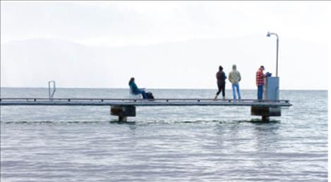 Fishermen try their luck at the dock at wayfarers state park.