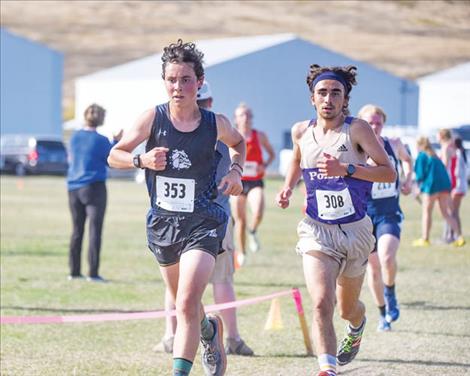 Mission Bulldog Robbie Nuila and Polson Pirate Ryan Dupuis race to the finish line.