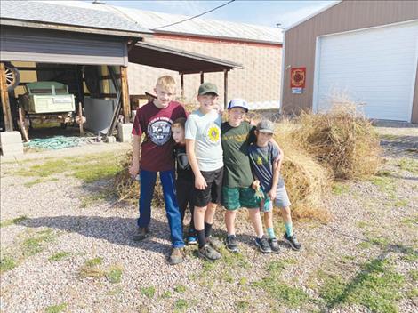 Boy Scout helpers from left are:  John David, Danny David, Conner Turner, Jaspin Fisher and Landin Fisher.