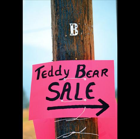 Hot pink signs lead buyers to Saturday’s bear sale.