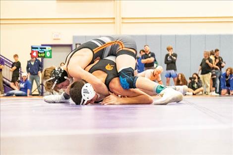 Ronan Chief wrestler Ridge Cote battles his way through the brackets to claim the 113-pound tile on during the annual Owen Invitational held at Linderman gymnasium in Polson on Friday and Saturday.