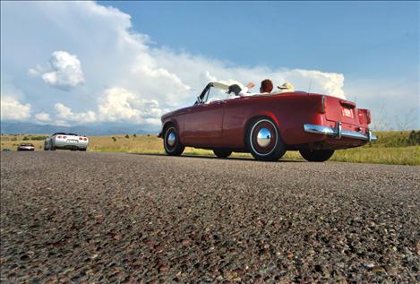 VIntage cars join hot rods and classics on a cruise around Polson Friday evening.