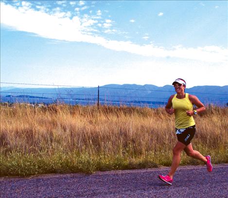 Ali Bronsdon runs the 10k leg of the Polson Triathlon Saturday, Aug. 17, the second woman finisher and 12th overall (2:17:54).