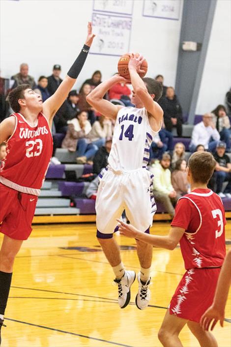 Charlo Viking Coyle Nagy shoots a jumper.