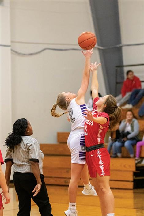 Charlo Lady Viking Kassidi Cox battles for the ball. 