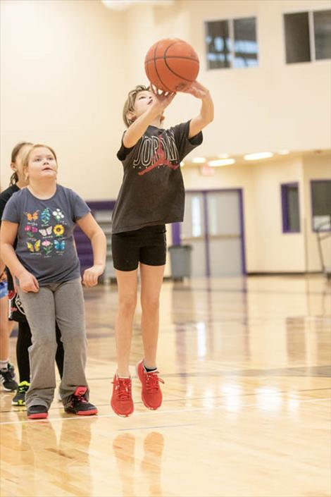Youngsters take aim at hoop fame during Saturday’s Mission Valley Elks Lodge #1695 annual Hoop Shoot held at Linderman Gymnasium in Polson.