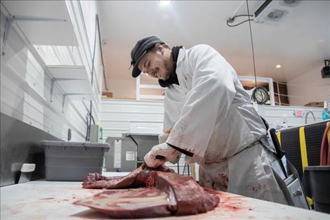 A custom wild game order is processed at the new D & J Meats facility in St. Ignatius.