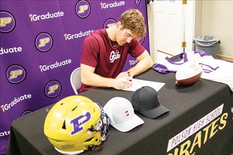 olson Pirate Braunson Henriksen signs a letter of intent with the University of Montana to join the Griz football team next fall.