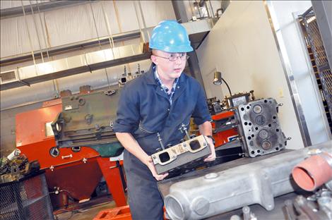 Austin Riley of Longmont, Colo., works in the diesel mechanic shop at Kicking Horse Job Corps.  