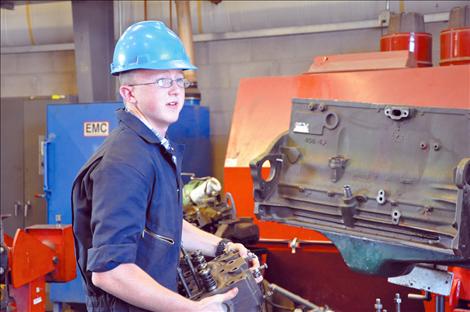 Austin Riley of Longmont, Colo., works in the diesel mechanic shop at Kicking Horse Job Corps.  