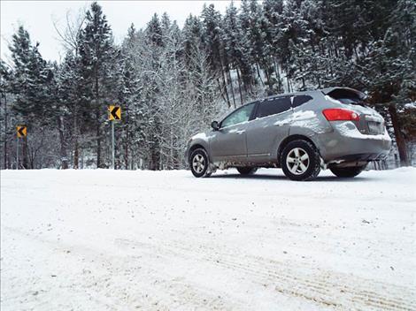 A shovel and cat litter can help get a car out of a ditch.