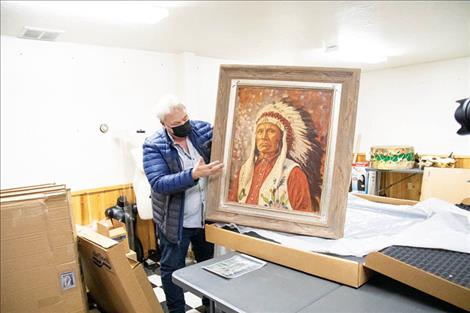 Joe Abbrescia, a Kalispell-based conservator specializing in restoring damaged works of art, explains the complex and tedious process used to restore the fire damaged historic paintings. 