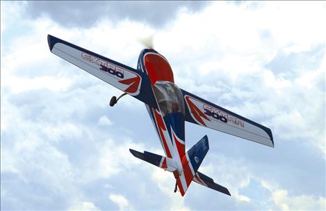 Clark Hymas controls his plane as it glides into the wild blue yonder.