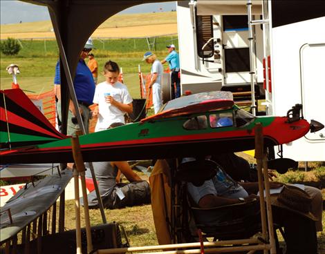 All ages enjoy the planes at the Wings for Wishes field on Minesinger Trail. Pilots flew their planes, spectators watched and food was available for the hungry.