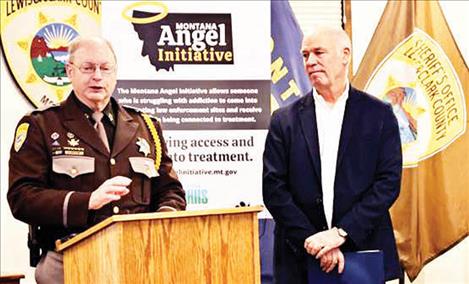 Lewis and Clark County Sheriff Leo Dutton and Governor Greg Gianforte speak about the Angel Initiative at the sheriff’s office.