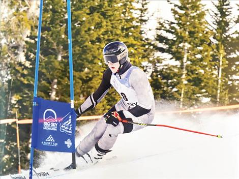 Otto Lund    races in the giant slalom.