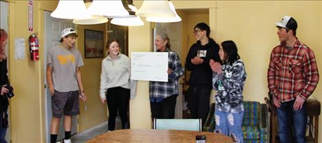 The teachers had kept the students’ win under wraps for two weeks before surprising them with the grant check.