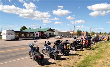 Motorcycles line Round Butte Road by the Ronan VFW.