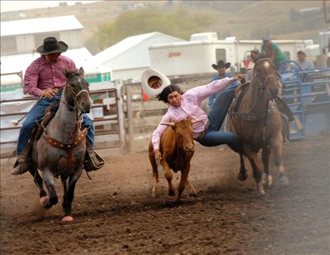 Otys LittleMustache steer wrestles.