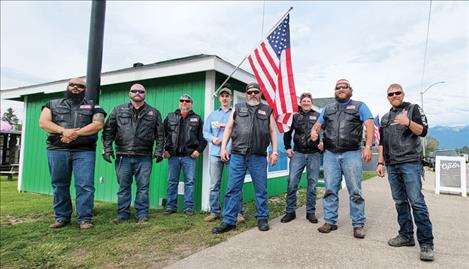  Raven Hall members stand for a photo with Flathead Lake Herb propietor Cori Monatukwa, who says he appreciates the groups efforts. The upcoming holiday he added, also marks his business’s one year anniversary.