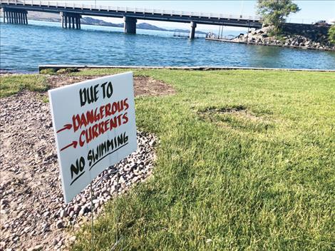 Riverside Park’s popular swimming area is currently off limits due to high water and dangerous currents in the lower Flathead River. 