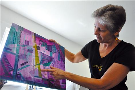 Louise Lamontagne shows an unfinished peice of work in her St. Ignatius studio. 