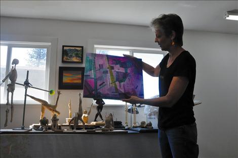 Louise Lamontagne shows an unfinished peice of work in her St. Ignatius studio. 