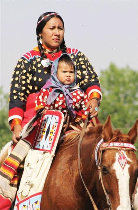 Hydee Wilson and her daughter, Charlie Kindness Wilson in Crow dress.