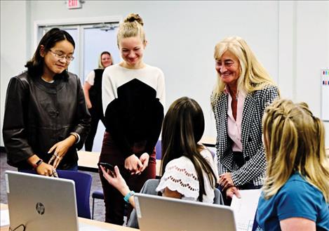 Members of Code Girls United share their app and ideas in Kalispell.