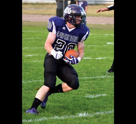 Charlo runningback Tyler Delaney heads toward the end zone during Friday's game against Noxon. 